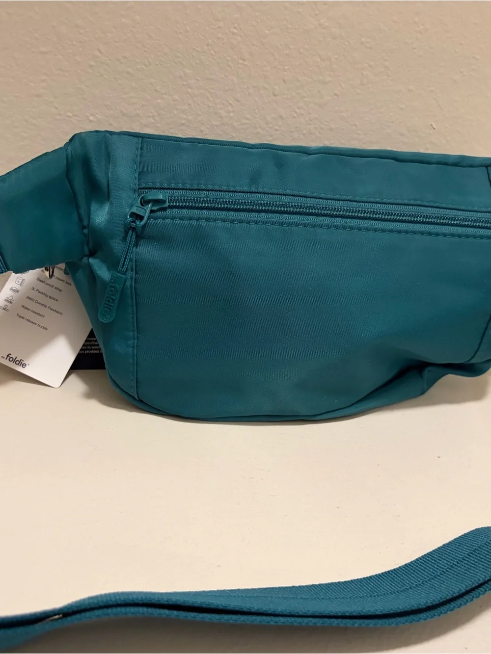 The Foldie Teal Waist Crossbody Bag RFID Blocking Travel Hand Free NWT